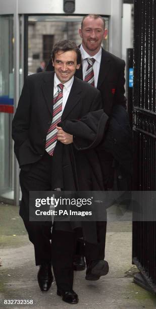 Irish rugby star Trevor Brennan and Toulouse official Jean Michel Roncouel leave Dublin High Court after securing a temporary injunction against...