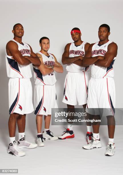 Al Horford, Mike Bibby, Josh Smith and Joe Johnson of the Atlanta Hawks pose for a portrait during NBA Media Day on September 29, 2008 at Philips...