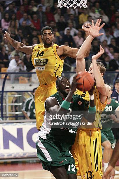 Jeremiah Massey of Aris TT Bank and Boniface N'Dong of Unicaja Malaga in action during the Euroleague Basketball Game 1 between Aris TT Bank and...