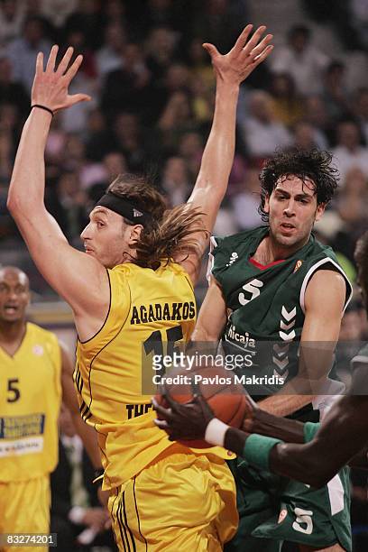 Lazaros Agadakos of Aris and Berni Rodriguez of Unicaja Malaga in action during the Euroleague Basketball Game 1 between Aris TT Bank and Unicaja at...