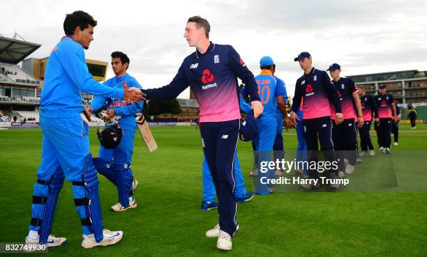 Members of both sides shake hands at the end of the match during the 5th Youth ODI match between England U19s and India Under 19s at The Cooper...