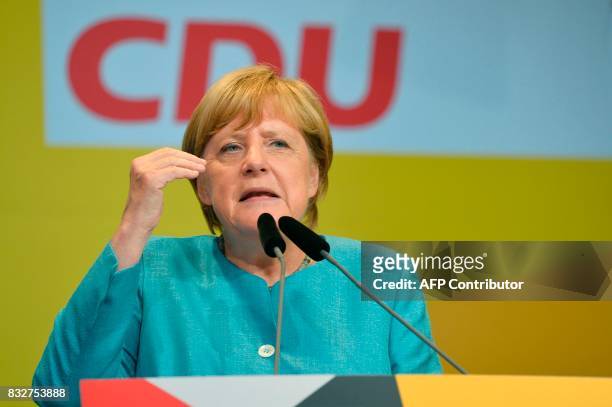German Chancellor Angela Merkel addresses an election campaign rally of the Christian Democratic Union in Heilbronn, southern Germany on August 16,...