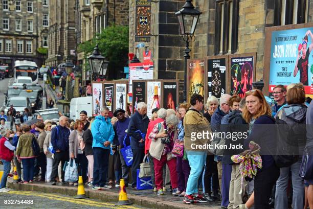 Fringe-goers queue for shows on offer during the Edinburgh Festival Fringe, on August 16, 2017 in Edinburgh, Scotland. The Fringe is celebrating its...