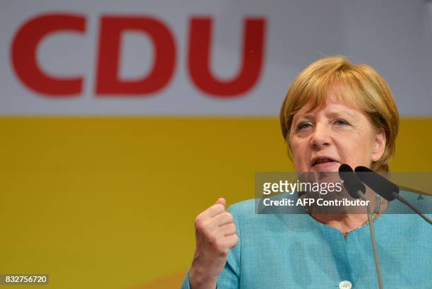 German Chancellor Angela Merkel addresses an election campaign rally of the Christian Democratic Union in Heilbronn, southern Germany on August 16,...
