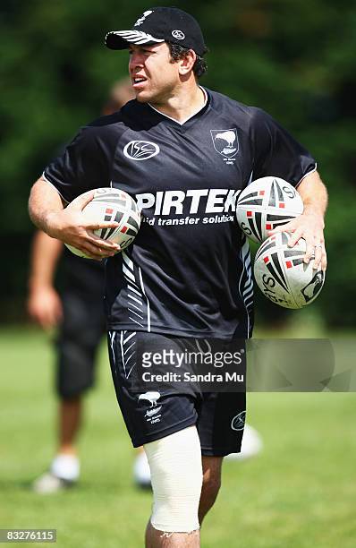 Nathan Cayless, captain of the Kiwis gathers the balls during a New Zealand Kiwis training session at Rosmini College on October 15, 2008 in...