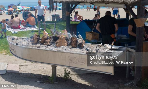 grilling seafood at playa de la caleta - playa de la caleta stock pictures, royalty-free photos & images