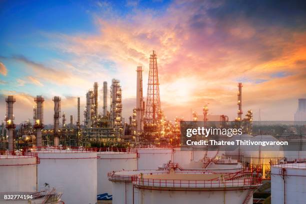 oil and gas industry - refinery factory - petrochemical plant - gas plant sunset stock-fotos und bilder