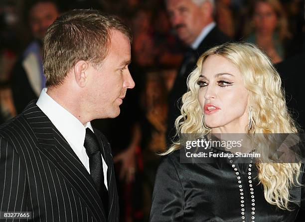 Director Guy Ritchie and Madonna attend the World Premiere of "RocknRolla" held at the Odeon West End, Leicester Square on September 1, 2008 in...