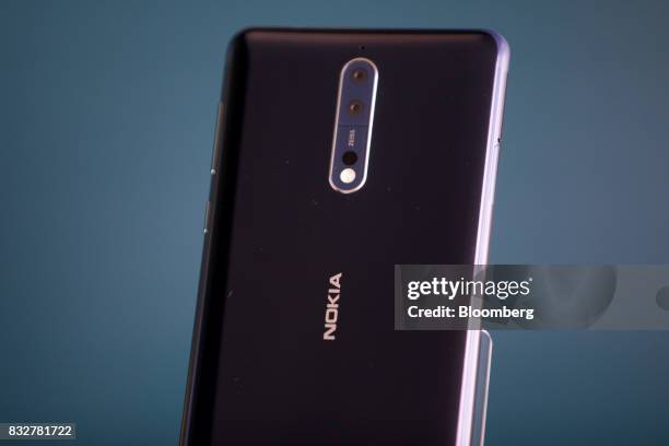 The Nokia 8 smartphone, designed by HMD Global Oy, sits on a stand ahead of its official unveiling in London, U.K., on Tuesday, Aug. 15, 2017. The...