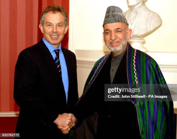 The Prime Minister Tony Blair shakes hands with the President of Afghanistan Hamid Karzai, after he arrived at number 10 Downing Street, for a...