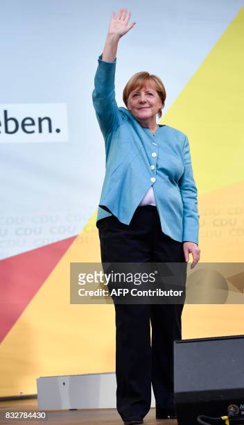 German Chancellor Angela Merkel waves after her speech at an election campaign rally of the Christian Democratic Union in Heilbronn, southern Germany...