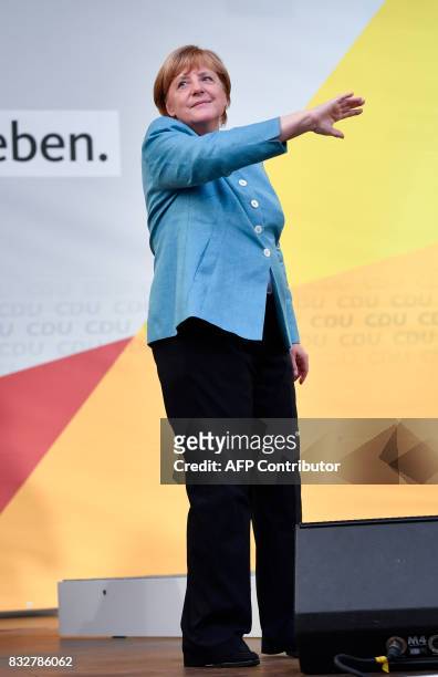 German Chancellor Angela Merkel waves after her speech at an election campaign rally of the Christian Democratic Union in Heilbronn, southern Germany...