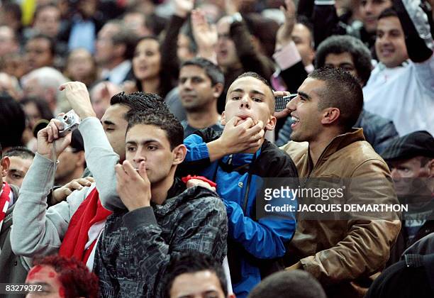 Supporters of Tunisian football national team are pictured before the start of the friendly football match France vs. Tunisia, on October 14, 2008 at...