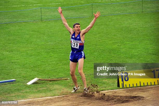 Great Britain's Jonathan Edwards breaks the world record. He would break the record again later in the day