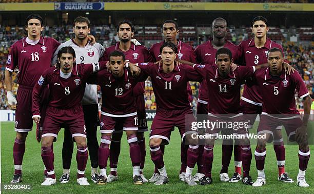 Qatar pose for a team photograph during the 2010 FIFA World Cup qualifier match between the Australian Socceroos and Qatar at Suncorp Stadium on...