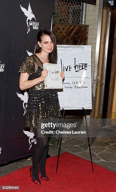 Actress Mia Kirshner attends the Pantheon Book Party For "I Live Here" at The Motley Bird Nest on October 14, 2008 in Los Angeles, California.