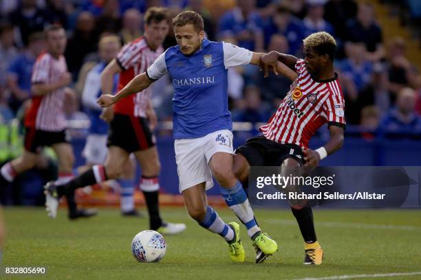 Didier Ndong of Sunderland and Almen Abdi of Sheffield Wednesday in action during the Sky Bet Championship match between Sheffield Wednesday and...