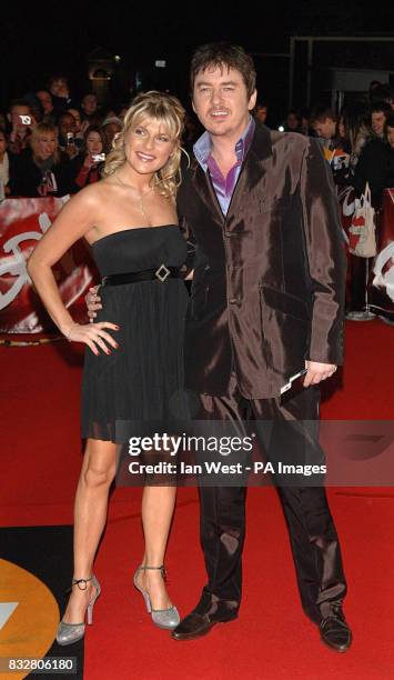 Christie Goddard and Shane Richie arrive for the Brit Awards 2007 at Earls Court Exhibition Centre in central London.
