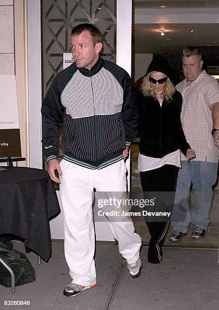 Director Guy Ritchie and wife singer Madonna leave the Kabbalah Center in Manhattan on July 11, 2008 in New York City.