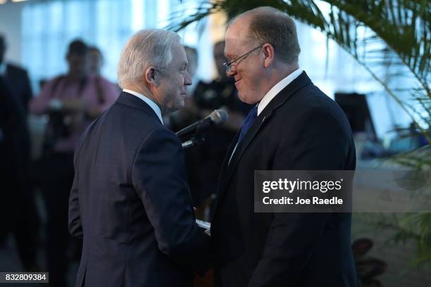 Attorney General Jeff Sessions is introduced by Acting Director Tom Homan, U.S. Immigration and Customs Enforcement before he speaks at PortMiami on...