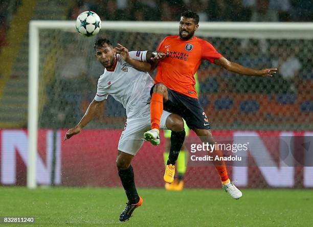 Gael Clichy of Medipol Basaksehir in action against Walter Montoya of Sevilla FC during the UEFA Champions League play-off match between Medipol...