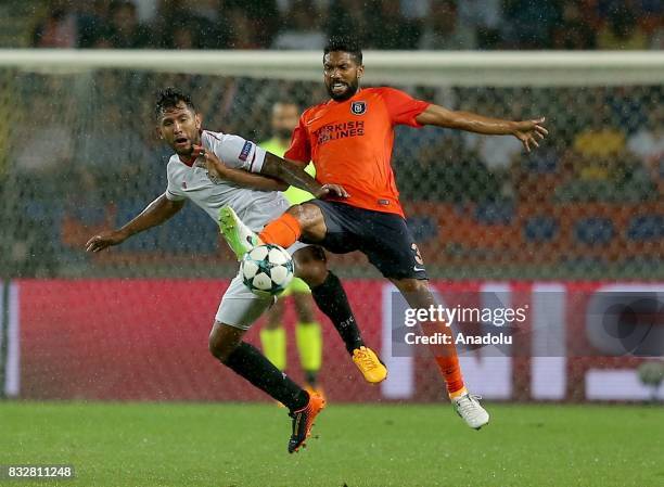 Gael Clichy of Medipol Basaksehir in action against Walter Montoya of Sevilla FC during the UEFA Champions League play-off match between Medipol...