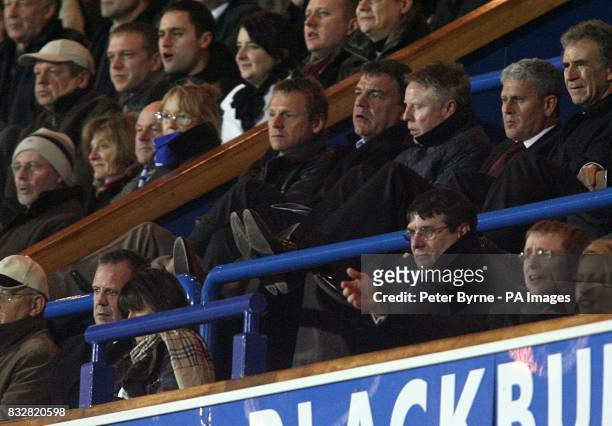 Manchester City manager Stuart Pearce watches the action with Bolton Wanderers manager Sam Allardyce