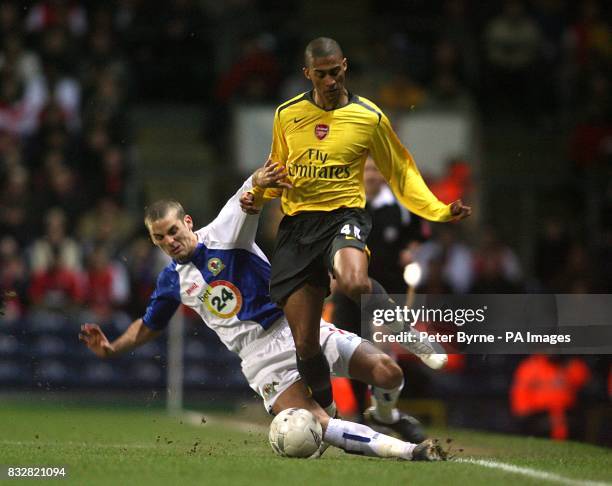 Arsenal's Armand Traore and Blackburn Rovers' David Bentley battle for the ball