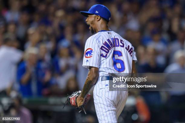 Chicago Cubs pitcher Carl Edwards Jr. Reacts to striking out Cincinnati Reds center fielder Billy Hamilton in the 7th inning during an MLB game...