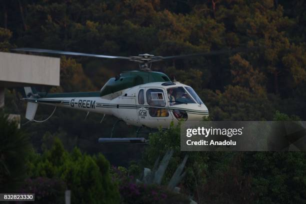 Helicopter of Saudi Prince Al-Waleed Bin Talal bin Abdulaziz al Saud arrives to land at hotel's helipad at Bodrum in Mugla Province of Turkey on...