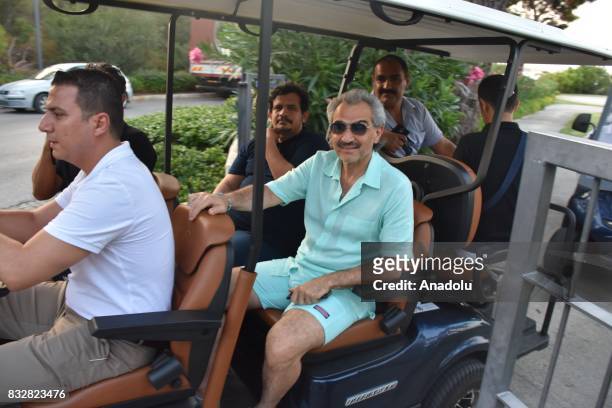 Saudi Prince Al-Waleed Bin Talal bin Abdulaziz al Saud takes a buggy ride while returning to the hotel at Bodrum in Mugla Province of Turkey on...