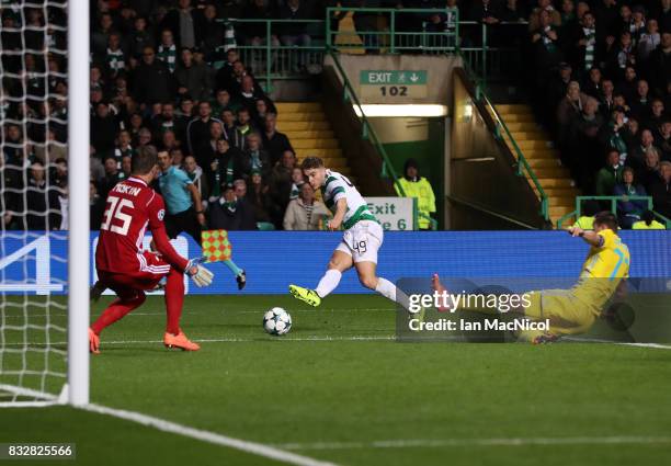 James Forrest of Celtic scores his team's fourth goal during the UEFA Champions League Qualifying Play-Offs Round First Leg match between Celtic FC...