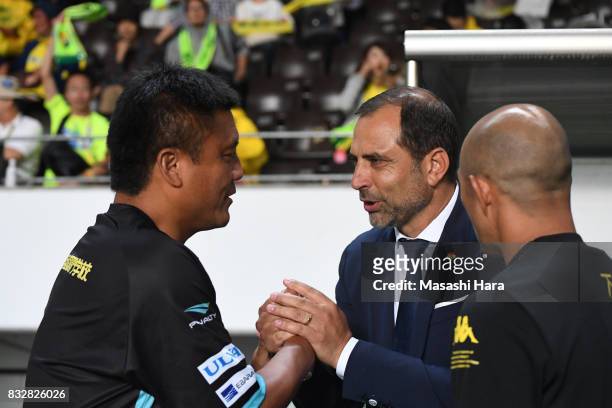 Juan Esnaider,coach of JEF United Chiba shake hands with Cho Kwi Jae,coach of Shonan Bellmare prior to the J.League J2 match between JEF United Chiba...