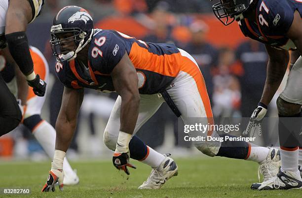 Defensive end Tim Crowder of the Denver Broncos rushes against the Jacksonville Jaguars during NFL action at Invesco Field at Mile High on October...