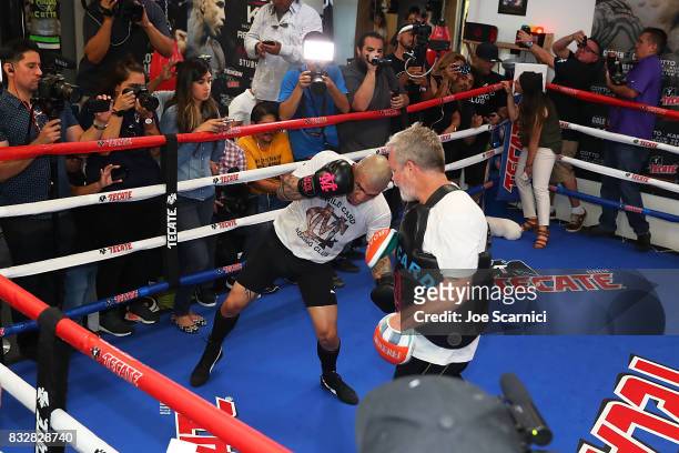 Miguel Cotto and Freddie Roach train during a media workout at Wild Card Gym on August 16, 2017 in Los Angeles, California. Cotto will fight...