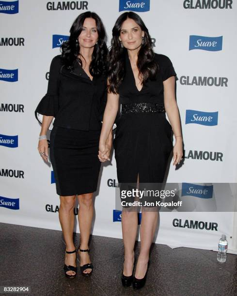 Actress Courteney Cox and actress Demi Moore arrive at the Glamour Presents "Reel Moments" at the Directors Guild of America on October 14, 2008 in...