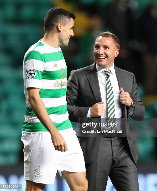 Celtic manager Brendan Rodgers celebrates at full time with Tomas Rogic of Celtic during the UEFA Champions League Qualifying Play-Offs Round First...