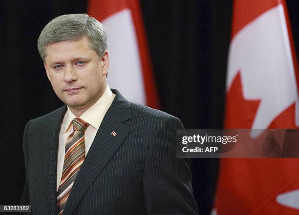 Canadian Prime Minister Stephen Harper speaks at a press conference in Calgary, on October 15 following his Conservative party's victory in Tuesday's...