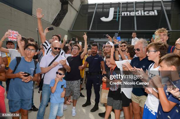 Supporters of Juventus FC greet new signing Blaise Matuidi prior to the medical tests.