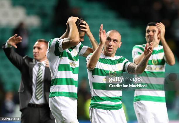 Scott Brown of Celtic celebrates at full time during the UEFA Champions League Qualifying Play-Offs Round First Leg match between Celtic FC and FK...