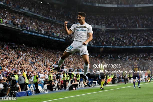 Marco Asensio of Real Madrid CF celebrates scoring their opening goal during the Supercopa de Espana Final 2nd Leg match between Real Madrid and FC...