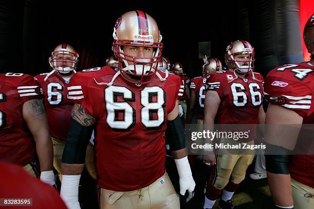 Guard Adam Snyder of the San Francisco 49ers prepares to enter the field before the NFL game against the Philadelphia Eagles on Bill Walsh Field at...