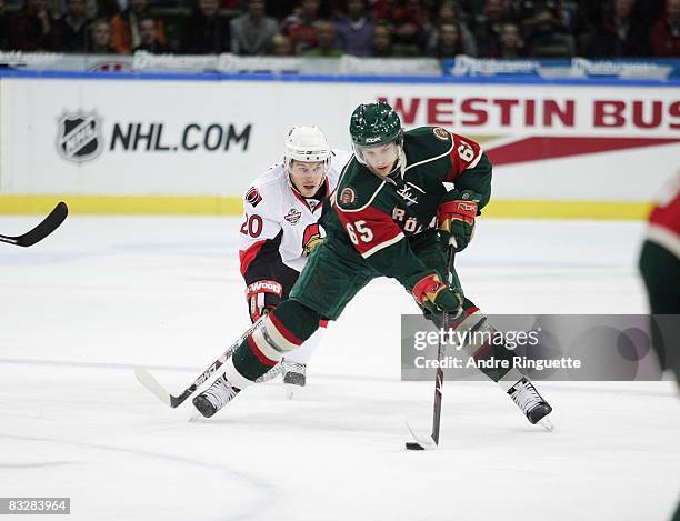 Erik Karlsson of the Frolunda Indians stickhandles the puck against Antoine Vermette of the Ottawa Senators at Scandinavium Arena on October 2, 2008...