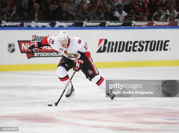 Jason Spezza of the Ottawa Senators skates up ice with the puck against the Frolunda Indians at Scandinavium Arena on October 2, 2008 in Gothenburg,...