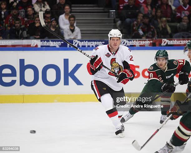 Chris Neil of the Ottawa Senators passes the puck against the Frolunda Indians at Scandinavium Arena on October 2, 2008 in Gothenburg, Sweden.