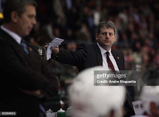 Curtis Hunt of the Ottawa Senators looks on from the bench against the Frolunda Indians at Scandinavium Arena on October 2, 2008 in Gothenburg,...
