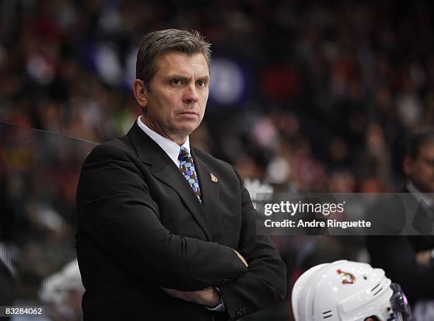 Craig Hartsburgh of the Ottawa Senators looks on from the bench against the Frolunda Indians at Scandinavium Arena on October 2, 2008 in Gothenburg,...