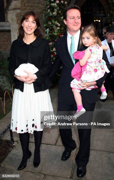 Tory party leader David Cameron, wife Samantha and daughter Nancy leave Christ Church, Kensington after attending the wedding of Alan Parker and Jane...