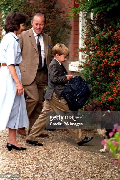 Prince William, eight, arriving at Ludgrove Preparatory School, Wokingham, watched by joint headmaster Nichol Marston.