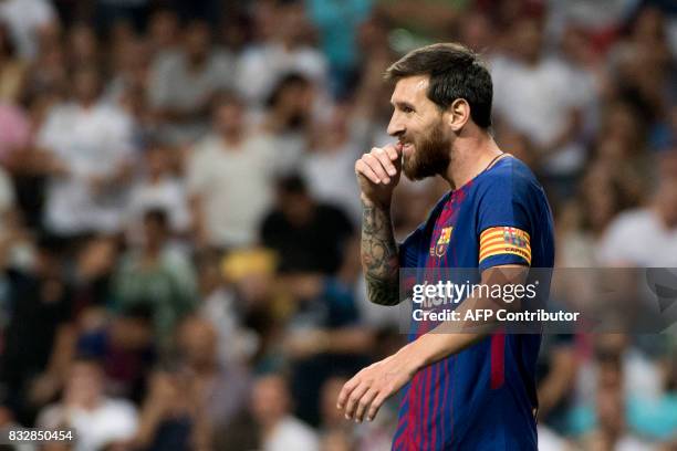 Barcelona's Argentinian forward Lionel Messi gestures during the second leg of the Spanish Supercup football match Real Madrid vs FC Barcelona at the...